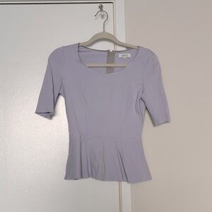 Aritzia Babaton lilac peplum top with zipper on back size 0